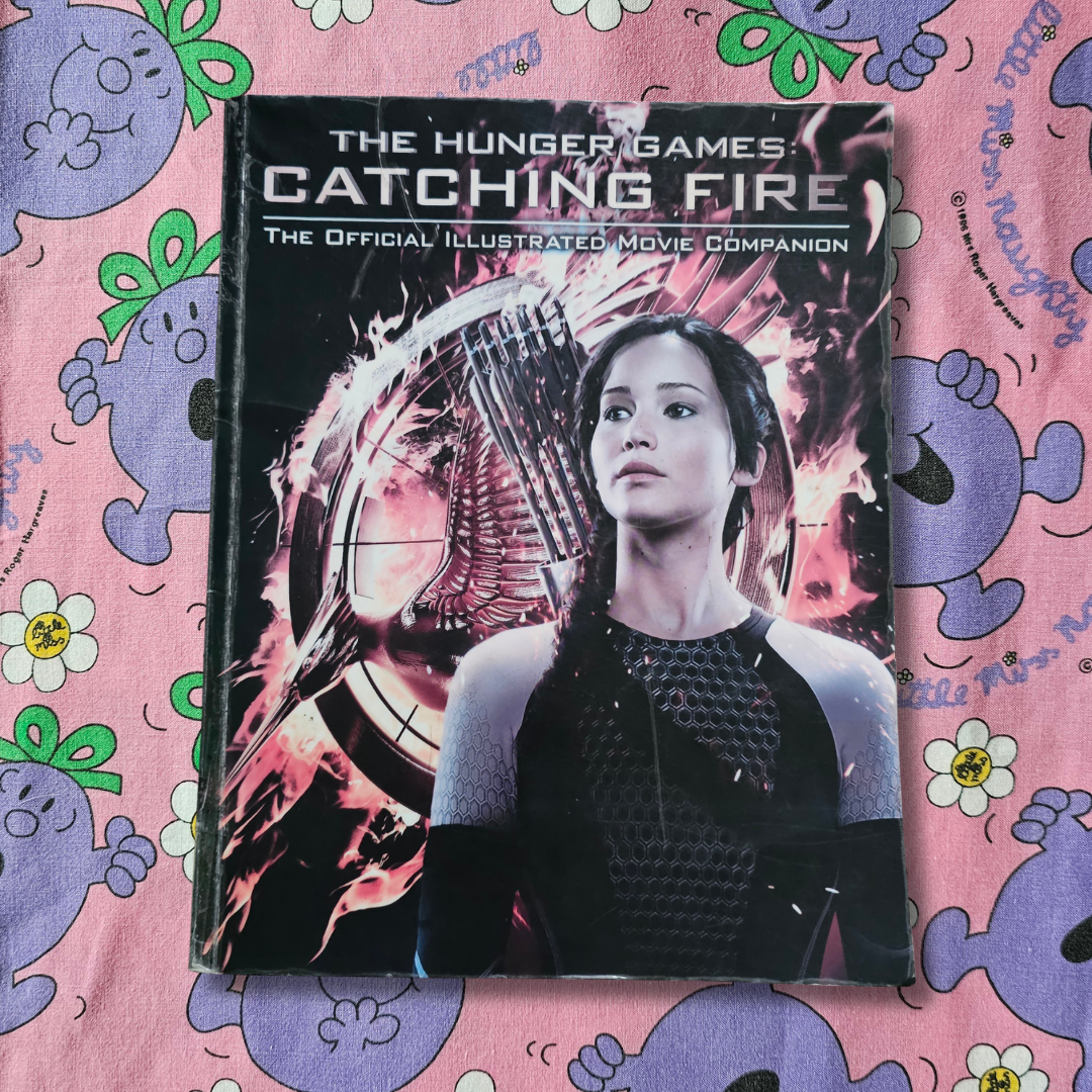 The Hunger Games: Catching Fire - The Official Illustrated Movie Companion (2013)