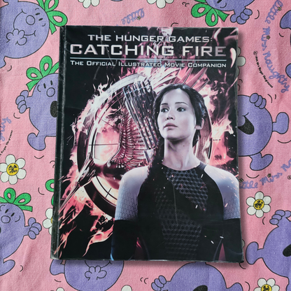 The Hunger Games: Catching Fire - The Official Illustrated Movie Companion (2013)