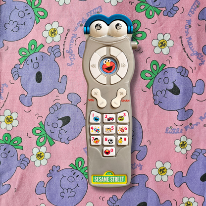 Fisher-Price Sesame Street Silly Sounds Giggle Remote (2006)